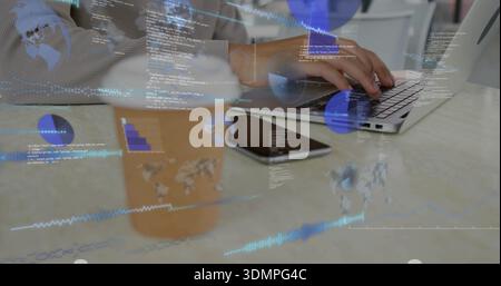 Typing adult male's hands pressing keys on laptop at tabletop, with phone, pad, digital overlays Stock Photo