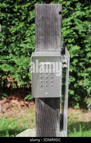 Secure password on keyboard for opening the gate door. Password code Security keypad system protected on private property. The security combination. Stock Photo