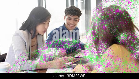 Studying 3 students reviewing papers in study by windows sharing phone speckled overlay in sweater Stock Photo