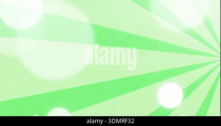 Radiating green radial sunburst fanning left on canvas showing white bokeh and faint grain vignette Stock Photo