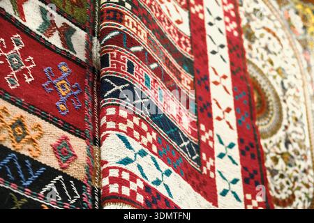 Traditional woven carpets with geometric oriental patterns Stock Photo
