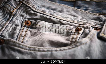 Denim jeans pocket with rivets close-up Stock Photo