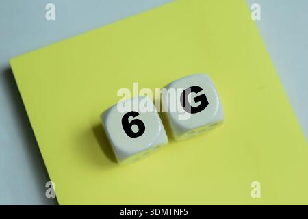 Concept of text 6G on wooden blocks. Technological development, new generation of mobile cellular communication Stock Photo
