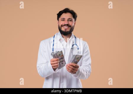 Rich Doctor Man Counting Usd Money. Handsome Medical Health Care Worker, Dollars Stock Photo
