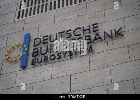 Berlin, Germany - November 29, 2024: Close-up of the Deutsche Bundesbank Eurosystem logo on the stone facade of its Berlin branch Stock Photo