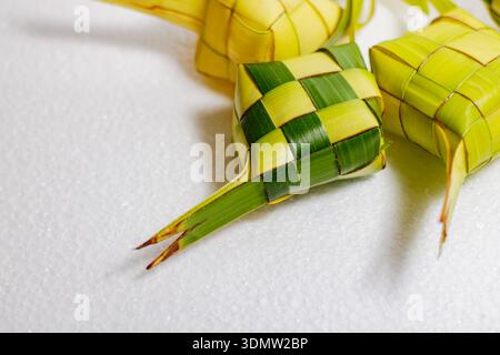 Traditional Ketupat Rice Cakes for Eid Celebration. Traditional Craft from Asian Culture. Islamic Celebration. High quality photo Stock Photo