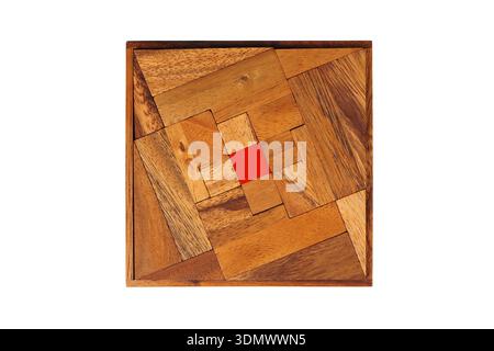 Wooden brain teaser isolated on white background Stock Photo