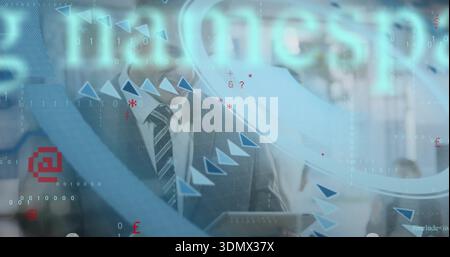 Holding tablet, executive in dark suit and tie reviewing HUD data on glass wall at office Stock Photo