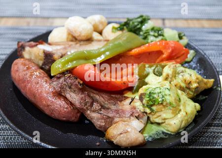 canarian barbecue meat plate maspalomas gran canaria, canary islands, spain Stock Photo