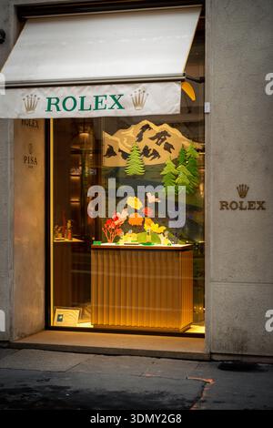 Milan, Italy - 2026, 3 Feb: Rolex FW25 boutique window with elegant mountain-themed display, vibrant colors, and luxury appeal in a stylish urban sett Stock Photo