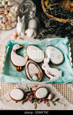 Delightful Easter-themed cookies featuring intricate designs of bunnies, eggs and ducks. Perfectly crafted for springtime celebrations and holiday gat Stock Photo