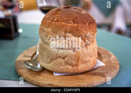 Traditional soup goulash in bread Stock Photo