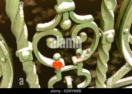A love lock on the Liberty Bridge in Budapest with snow Stock Photo