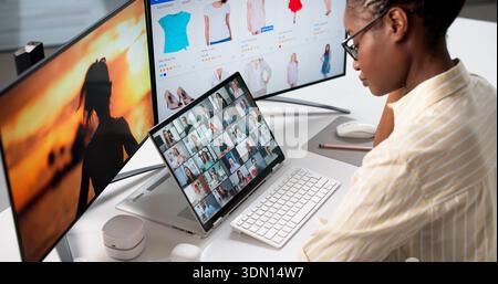 Young Woman Watching Videos During Remote Hybrid Conference For Business. Stock Photo