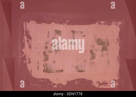 An old wall with plaster and wallpaper removed for a new room renovation. Red and orange paint on the wall. Stock Photo