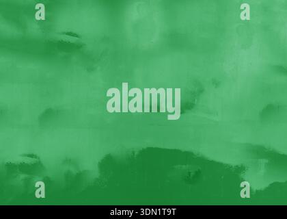 Wall with worn paint and plaster. Concrete wall with faded and worn green paint. Stock Photo
