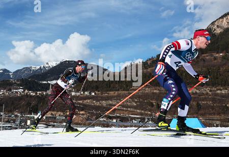 08 February 2026 Italy Tesero Olympia Olympic Winter Games Milan 08 February 2026 Italy Tesero Olympia Olympic Winter Games Milan Cortina 2026 Nordic Skiingcross Country Skiing Skiathlon 2 X 10 Km Men Florian Notz L Germany And Hunter Wonders Usa Are On The Track Photo Daniel Karmanndpa 3dn2f6k 