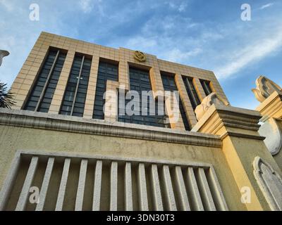 Office of the Council of Ministers, Phnom Penh, Cambodia, modern architectural style with prominent vertical window sections, light-colored facade Stock Photo