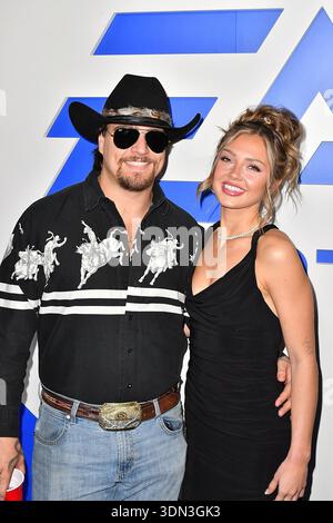Gavin Adcock, Haley Larkin attend Madden Bowl presented by SUPER BOWL