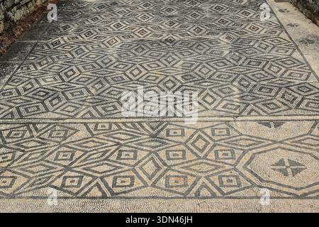 Mosaics decorating the floors of villas in the ancient Roman city of Conimbriga in Portugal Stock Photo