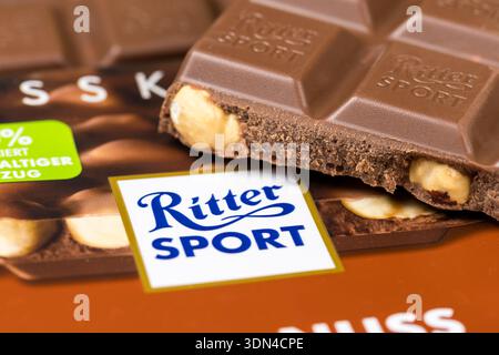 Stuttgart, Germany - September 19, 2025: Ritter Sport nuts chocolate bar close-up with company logo in Stuttgart, Germany. Stock Photo
