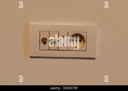 Wall Electrical Socket Panel Multiple Connectors Stock Photo