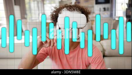Sitting man wearing white VR headset and salmon T-shirt on sofa at home, with waveform overlay Stock Photo