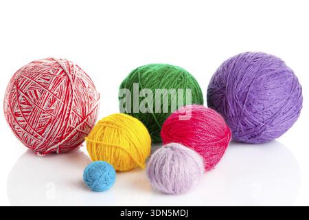 Colorful different thread balls. wool knitting on white background Stock Photo