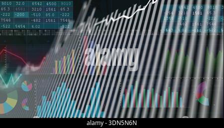 Displaying finance dashboard on monitor, showing bar charts, upward white line, data matrix, slats Stock Photo