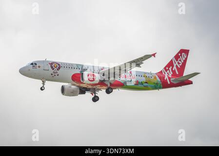 AirAsia Airbus A320-216 airliner in bright yellow livery
