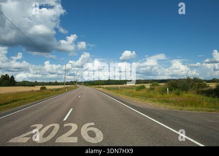 Highway road to 2026. Empty road with written 2026 and arrow pointing ...