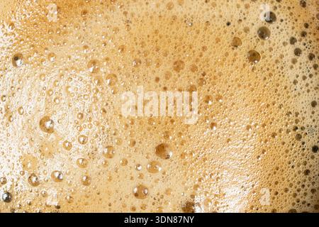 Brown and gold coffee bubbles texture for culinary background Stock Photo
