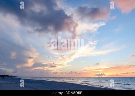 Beautiful colored cloudy evening sky. Sky with clouds at sunset. Seascape. Stock Photo