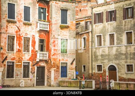 go off the beaten track and look behind the veneer of the city. Venice is such a fascinating place. Courtyard and close up. Stock Photo