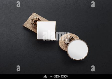 Blank white gold round and square enamel pin mockup, dark background, 3d rendering. Empty golden clasp badge stack mock up, side view. Clear metal lap Stock Photo