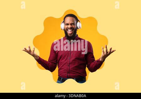 Man Enjoying Music With Headphones on a Bright Background With a Cheerful Expression Stock Photo