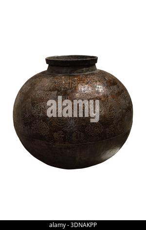 Central Asian copper vessel. Engraved with Quranic verse and sublication used for storing and distribution of holy Zamzam water brought by the Haj pilgrimage for general public. Early 20th century. Stock Photo