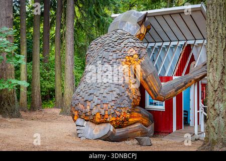 Giant wooden troll sculpture by Danish artist Thomas Dambo at the