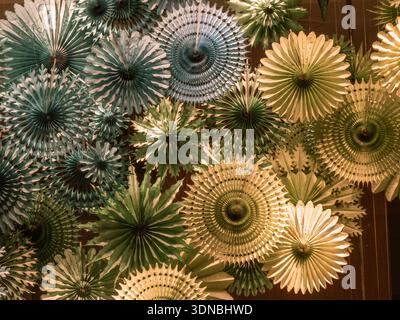 Colorful lantern pattern: Blue, green, yellow lampions in gear-like, geometric, spiral shapes, each unique, filling the image as ideal PC background. Stock Photo