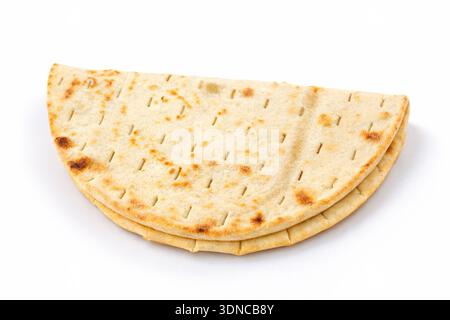Folded wheat tortilla isolated on a white background, wrap-type flatbread for Tex-Mex cuisine Stock Photo