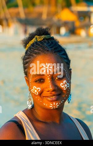 Madagascar, Atsimo-Andrefana region, Ifaty, Vezo country, Mangily beach, young woman in local makeup Stock Photo