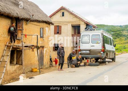 Madagascar, Vakinankaratra region, National road 7 or RN7, Ambohimanjaka, broken down bush taxi, repair on the road Stock Photo