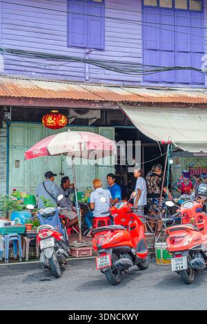 Thailand, Uthai Thani, small town with purple painted wooden houses in honor of Princess Maha Chakri Sirindhorn, daughter of Rama IX and sister of the current king, beloved by the Thais and born on a Saturday, a day associated with the color purple Stock Photo
