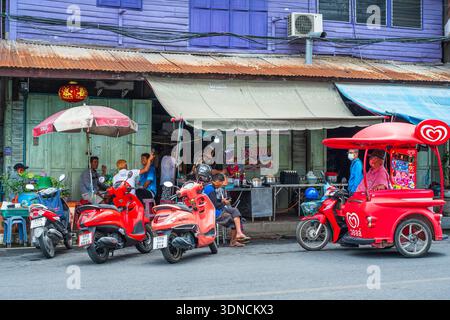 Thailand, Uthai Thani, small town with purple painted wooden houses in honor of Princess Maha Chakri Sirindhorn, daughter of Rama IX and sister of the current king, beloved by the Thais and born on a Saturday, a day associated with the color purple Stock Photo