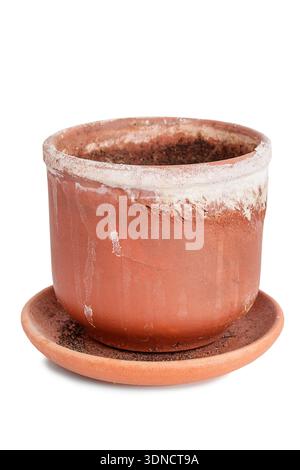 Used dirty empty clay flower pot with a saucer isolated over white Stock Photo
