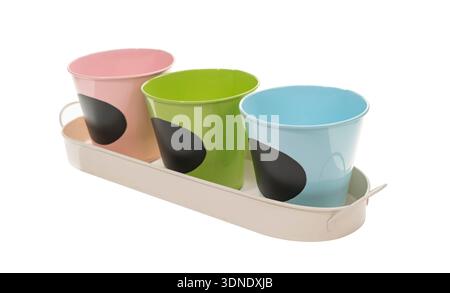 three colorful flower pots isolated on .a white background Stock Photo