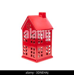 Red ceramic Christmas candle house isolated on white background Stock Photo