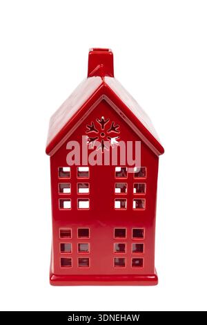 Red ceramic Christmas candle house isolated on white background Stock Photo