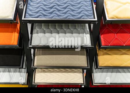 Samples of a leather and fabric for a upholstery of interior of the car Stock Photo