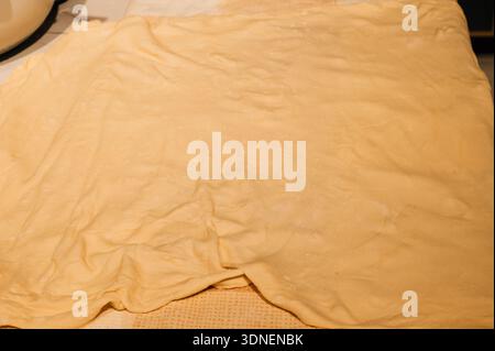Thinly rolled out strudel dough. High quality photo Stock Photo